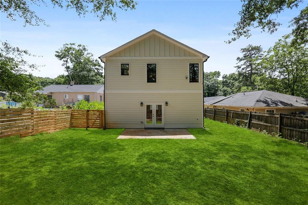 2145 Park Terrace Atlanta, GA 30337 - Photo 3 of 24 a view of a house with a yard and sitting area