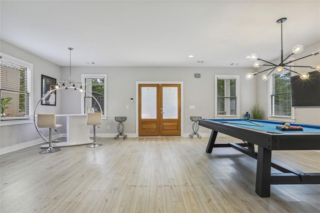 2145 Park Terrace Atlanta, GA 30337 - Photo 4 of 24 a living room with furniture a table and wooden floor