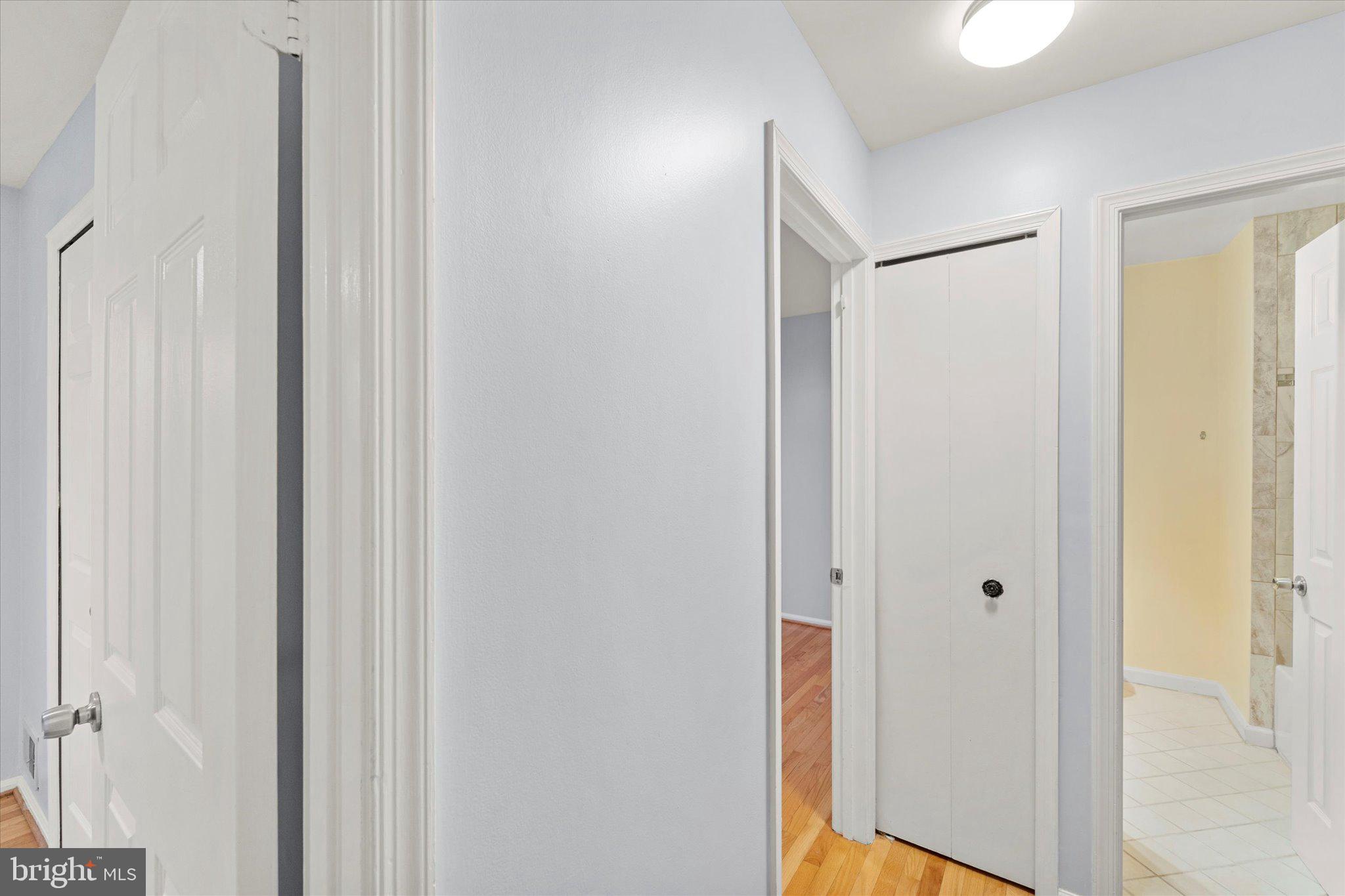 7907 Forest Path Way Springfield, VA 22153 - Photo 14 of 34 a view of a bathroom with a shower