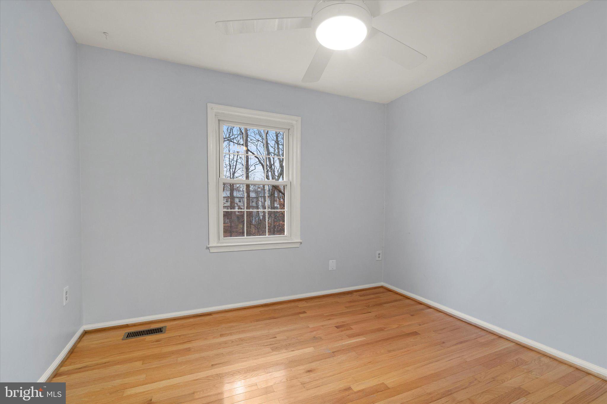 7907 Forest Path Way Springfield, VA 22153 - Photo 21 of 34 an empty room with a window