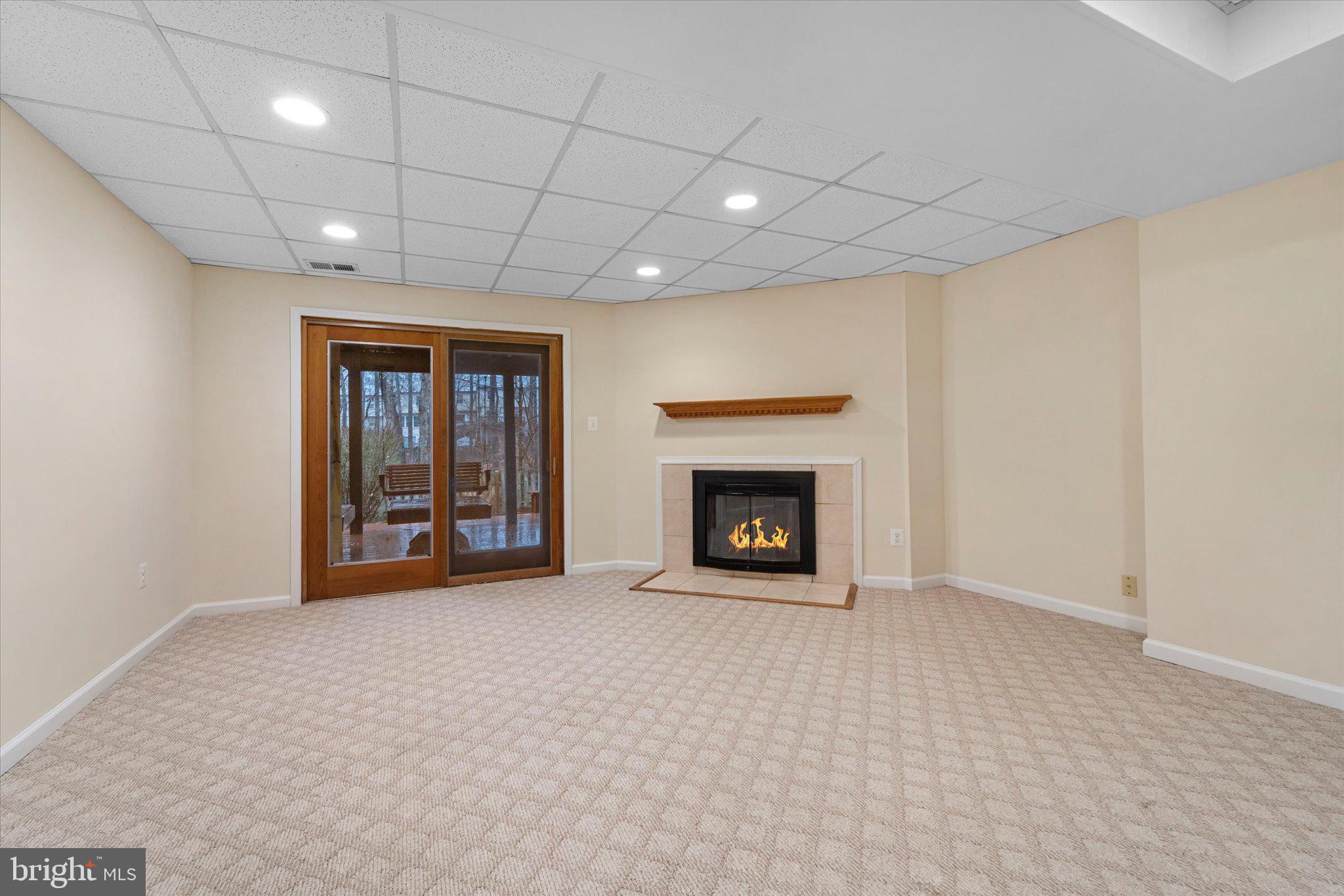 7907 Forest Path Way Springfield, VA 22153 - Photo 25 of 34 a view of an empty room with a fireplace