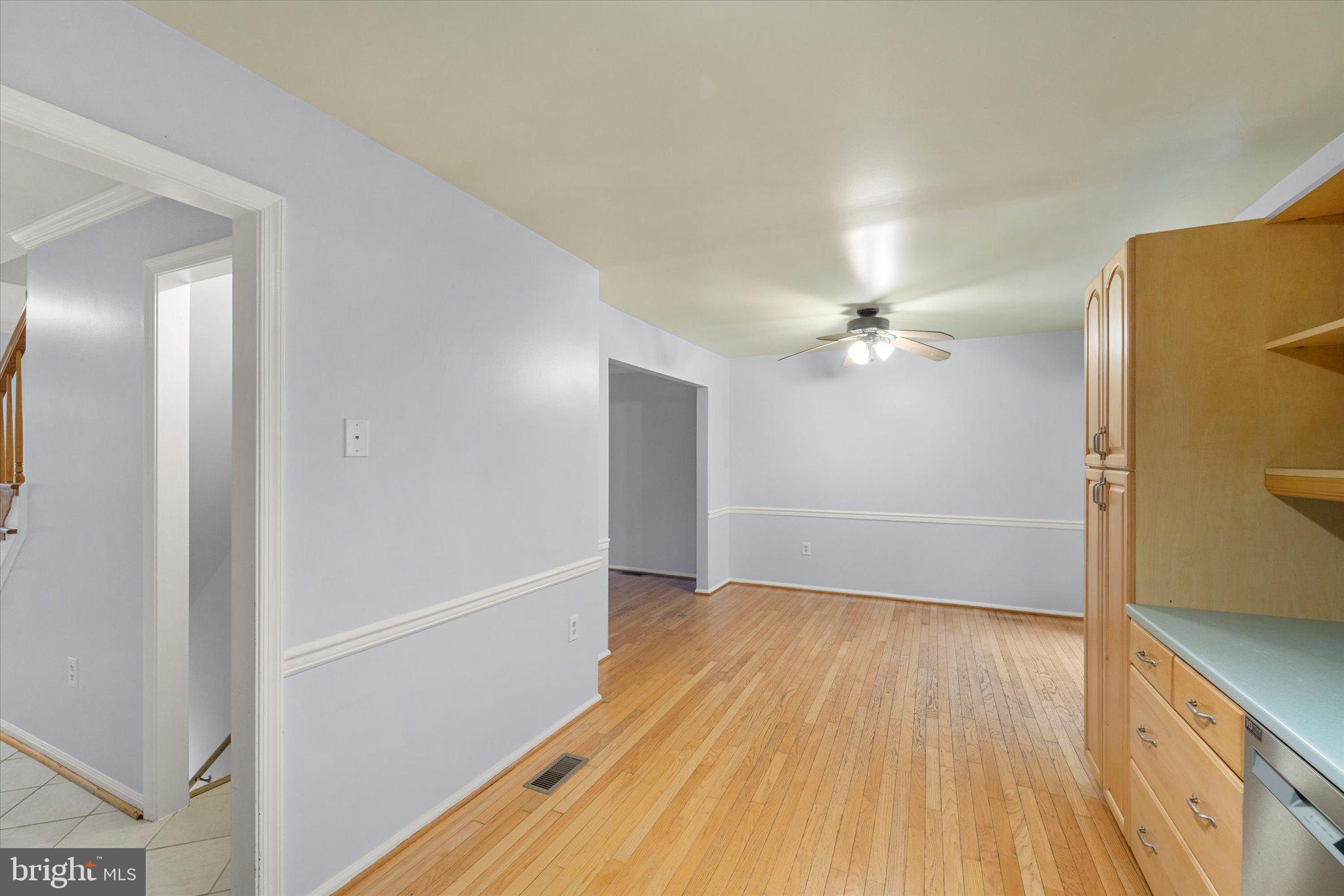 7907 Forest Path Way Springfield, VA 22153 - Photo 7 of 34 a view of a livingroom with wooden floor