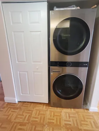 a utility room with dryer and washer