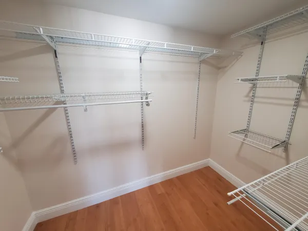 a view of a room with racks on the wall
