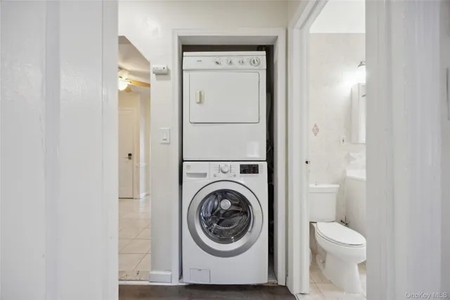 a view of a bathroom with a washer and dryer