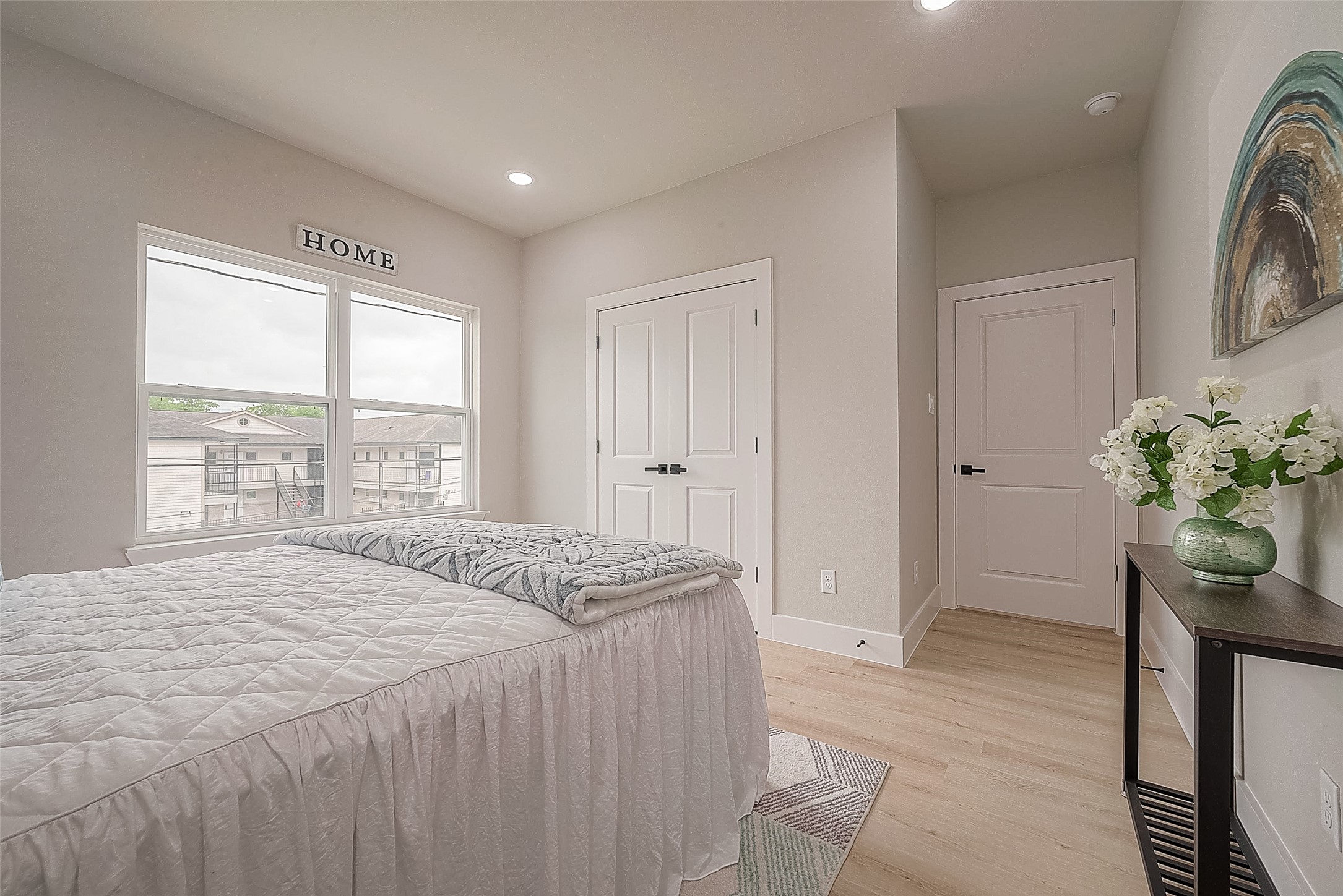 3837 Mainer Street Houston, TX 77021 - Photo 14 of 19 a spacious bedroom with a bed and a window
