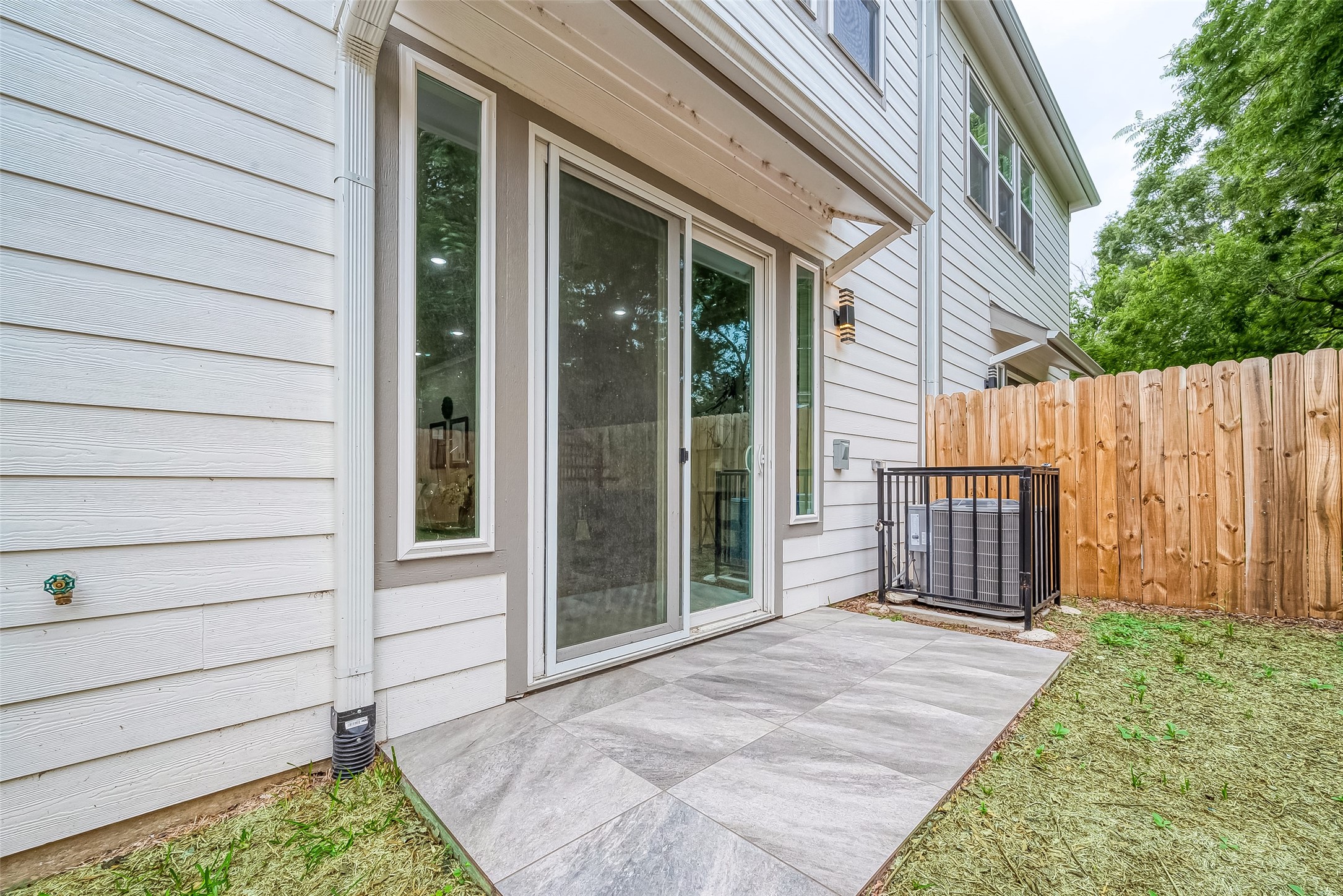 3837 Mainer Street Houston, TX 77021 - Photo 17 of 19 a view of house with backyard and wooden fence