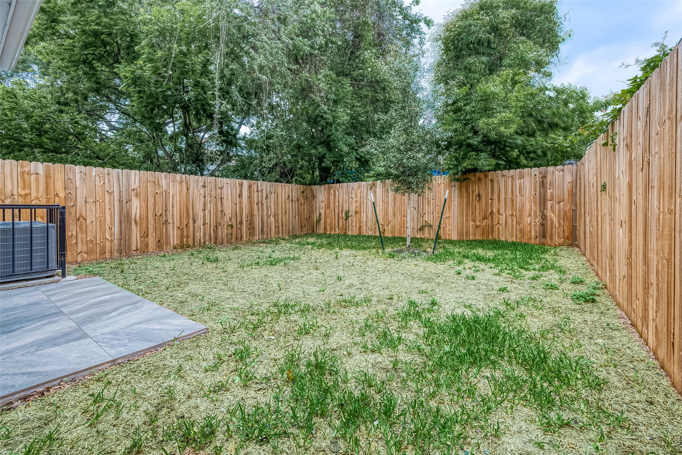 3837 Mainer Street Houston, TX 77021 - Photo 19 of 19 a view of backyard with wooden fence