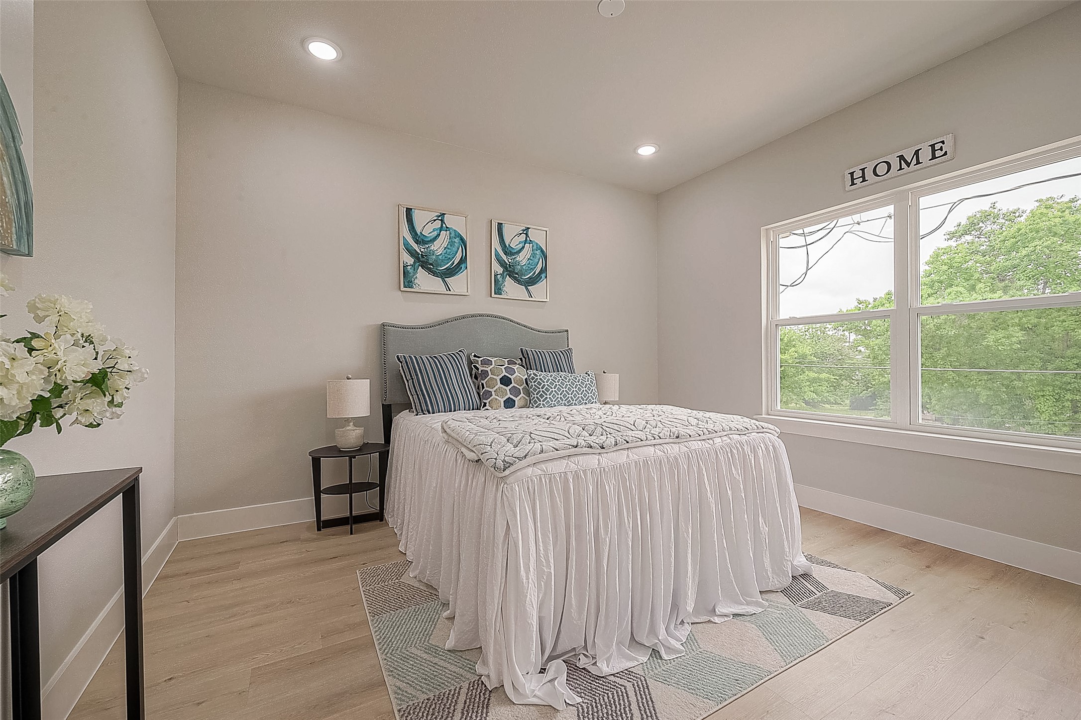 3837 Mainer Street Houston, TX 77021 - Photo 3 of 19 a bedroom with a bed and a window