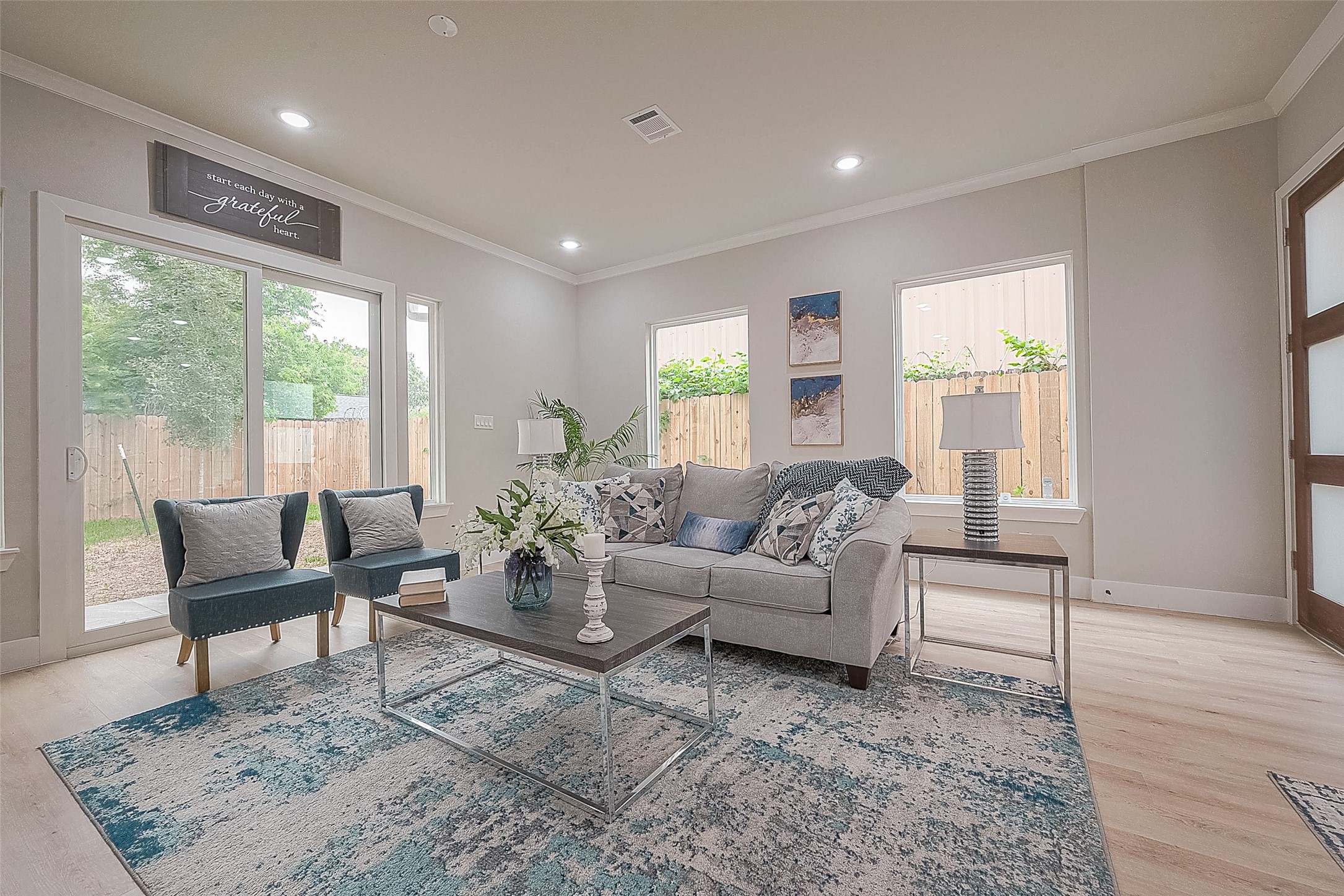 3837 Mainer Street Houston, TX 77021 - Photo 10 of 19 a living room with furniture and a large window
