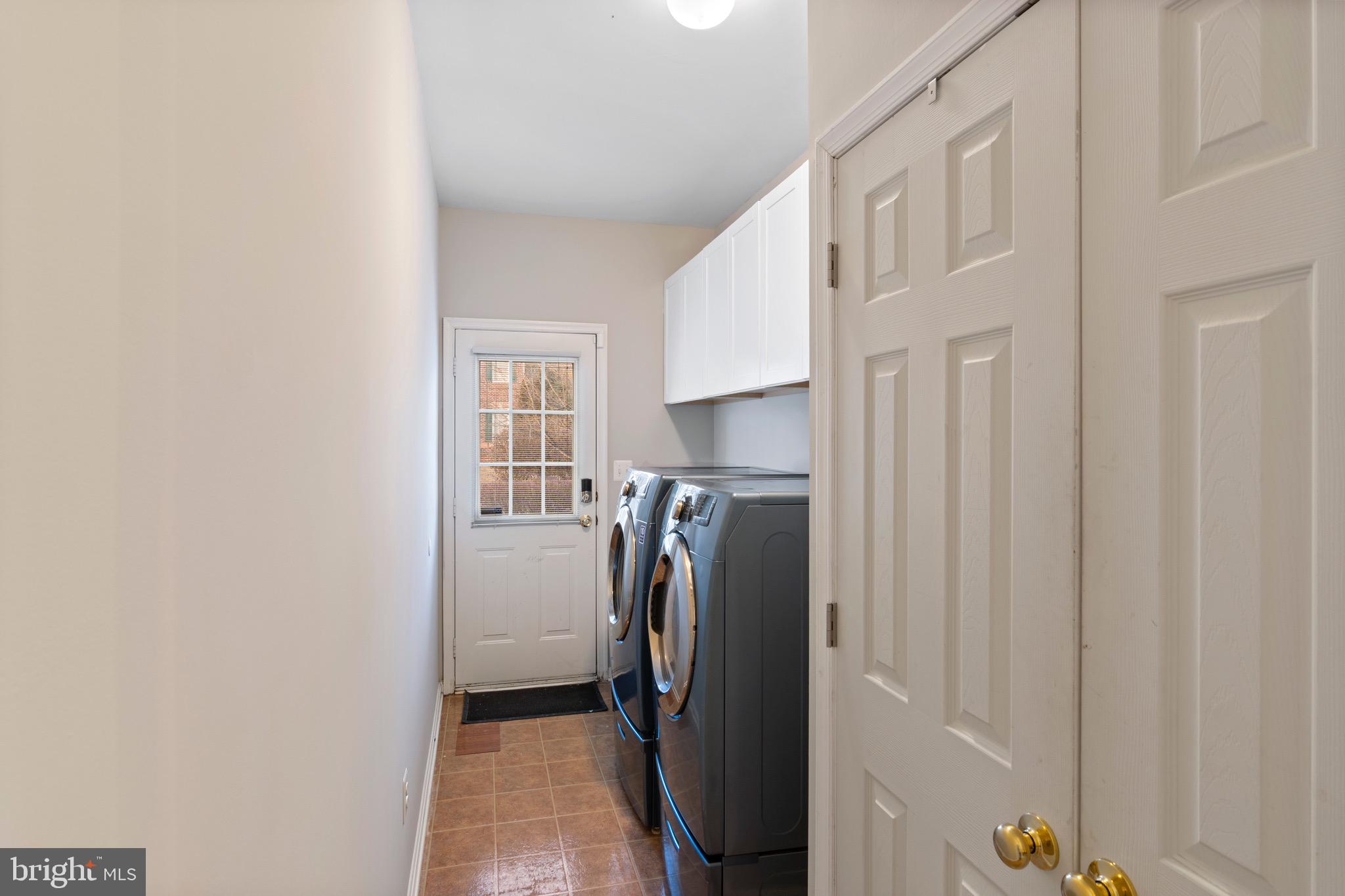 814 Stable Manor Road Reisterstown, MD 21136 - Photo 17 of 49 Laundry room with side walkout