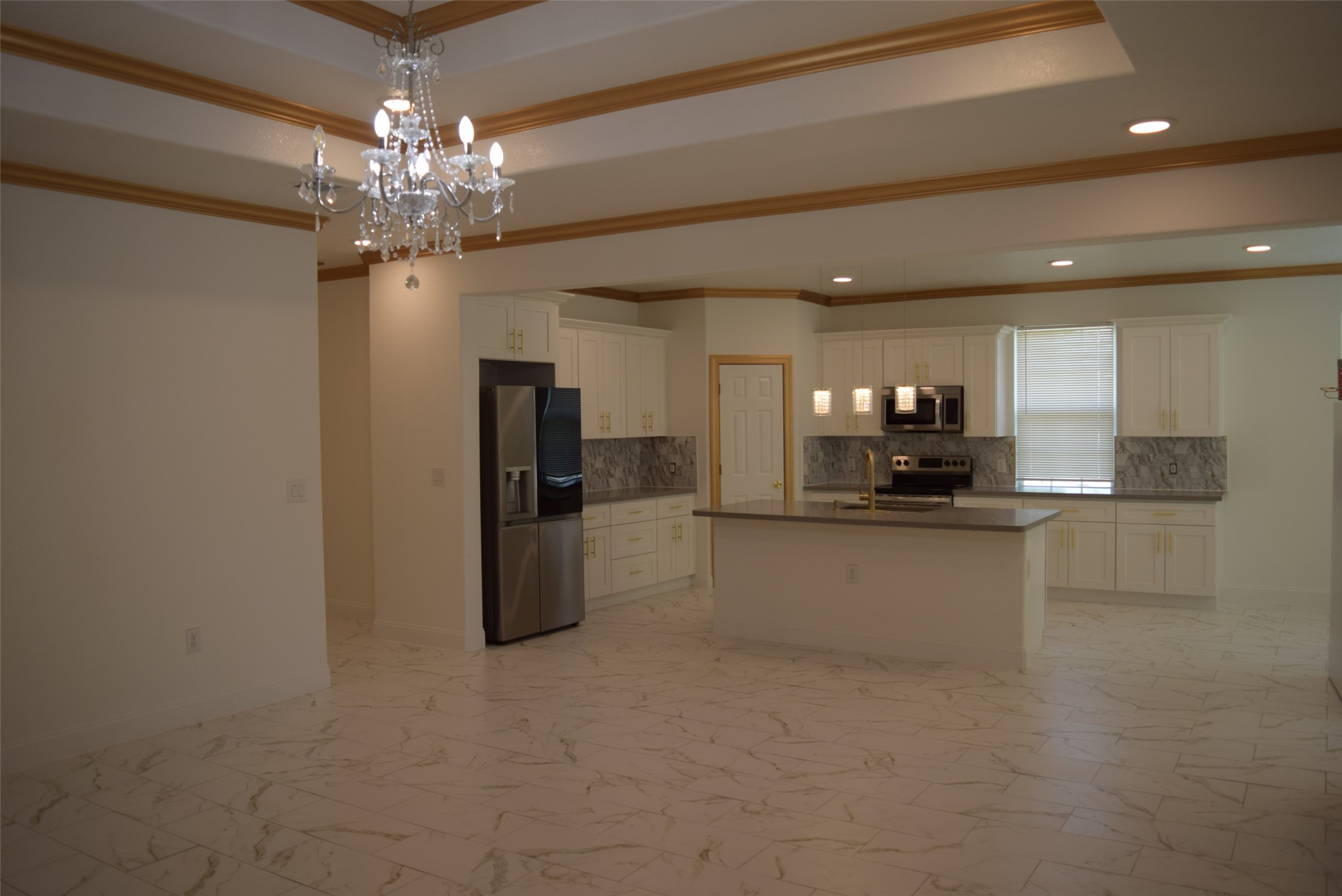 445 Road 5102 Cleveland, TX 77327 - Photo 11 of 36 a view of kitchen with refrigerator and microwave