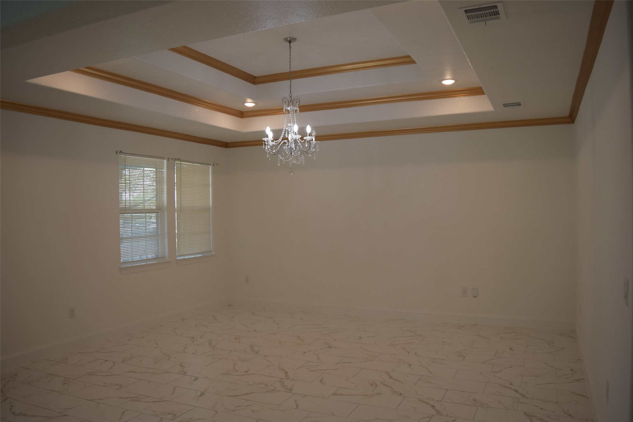 445 Road 5102 Cleveland, TX 77327 - Photo 12 of 36 a view of a chandelier in a room