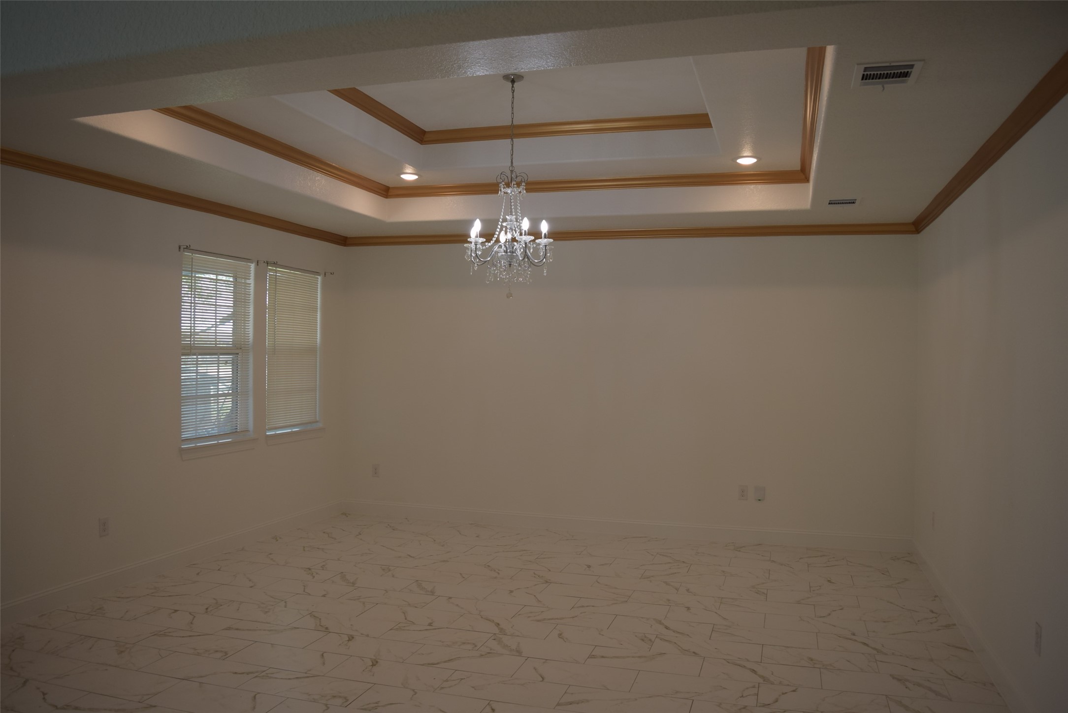 445 Road 5102 Cleveland, TX 77327 - Photo 13 of 36 a view of a room with window and chandelier