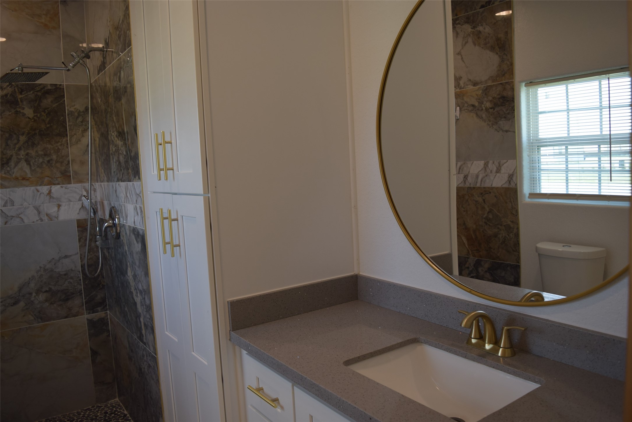 445 Road 5102 Cleveland, TX 77327 - Photo 22 of 36 a bathroom with a sink and a mirror