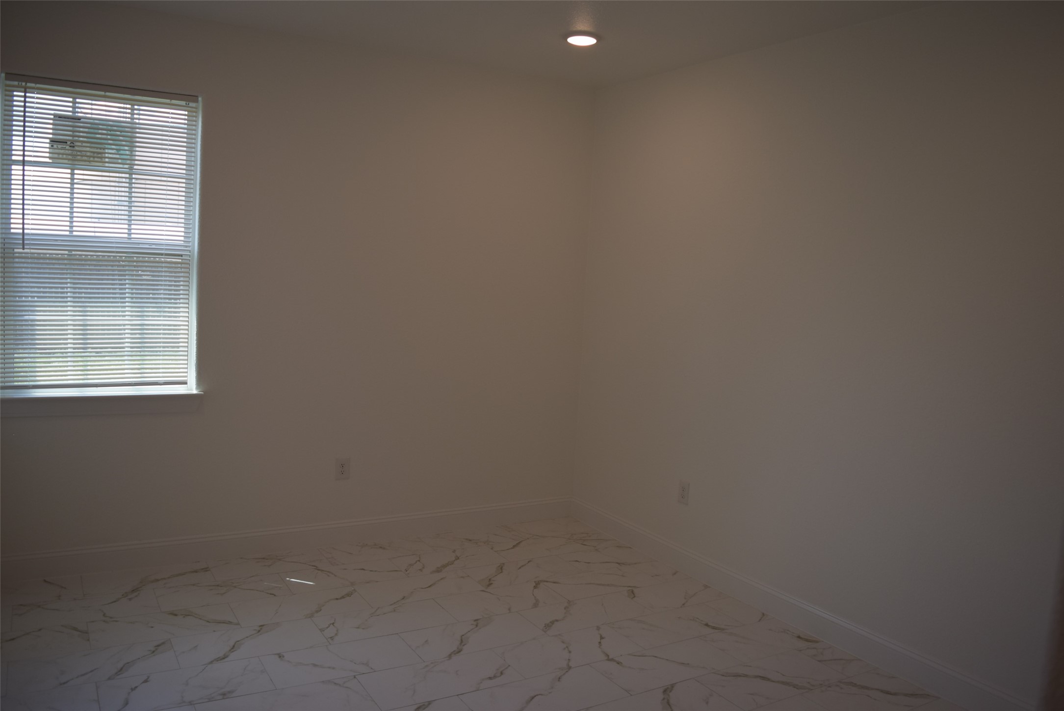 445 Road 5102 Cleveland, TX 77327 - Photo 26 of 36 close up of a white marble wall