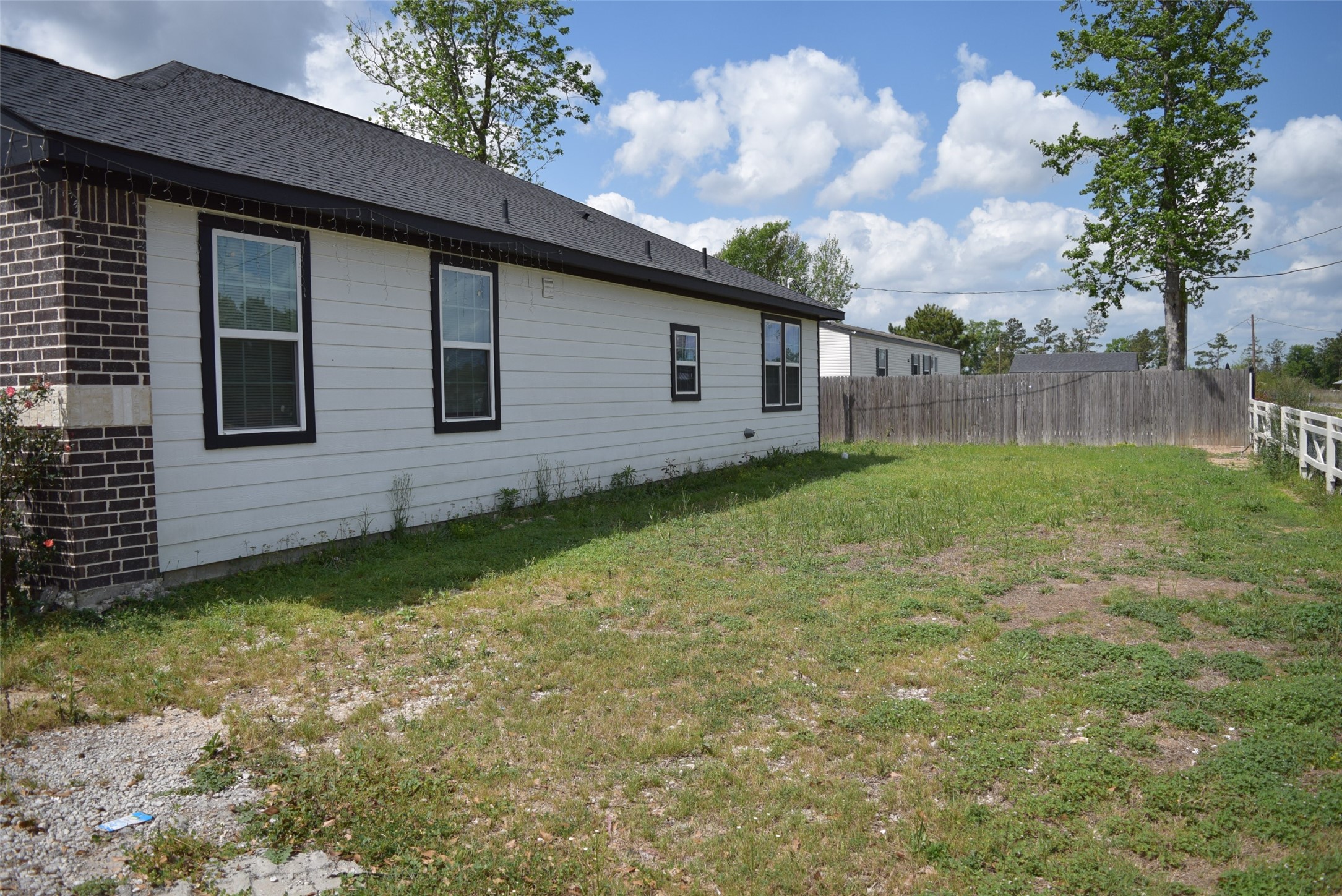 445 Road 5102 Cleveland, TX 77327 - Photo 36 of 36 a backyard of a house with lots of green space