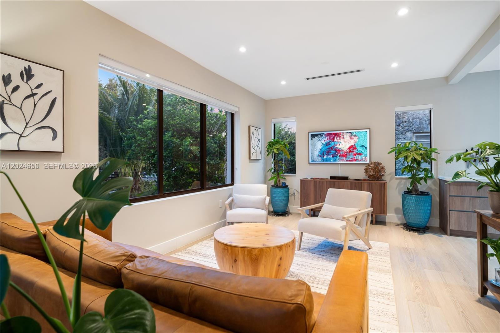 1663 Southwest 13th Street Miami, FL 33145 - Photo 61 of 112 a living room with furniture potted plant and a large window