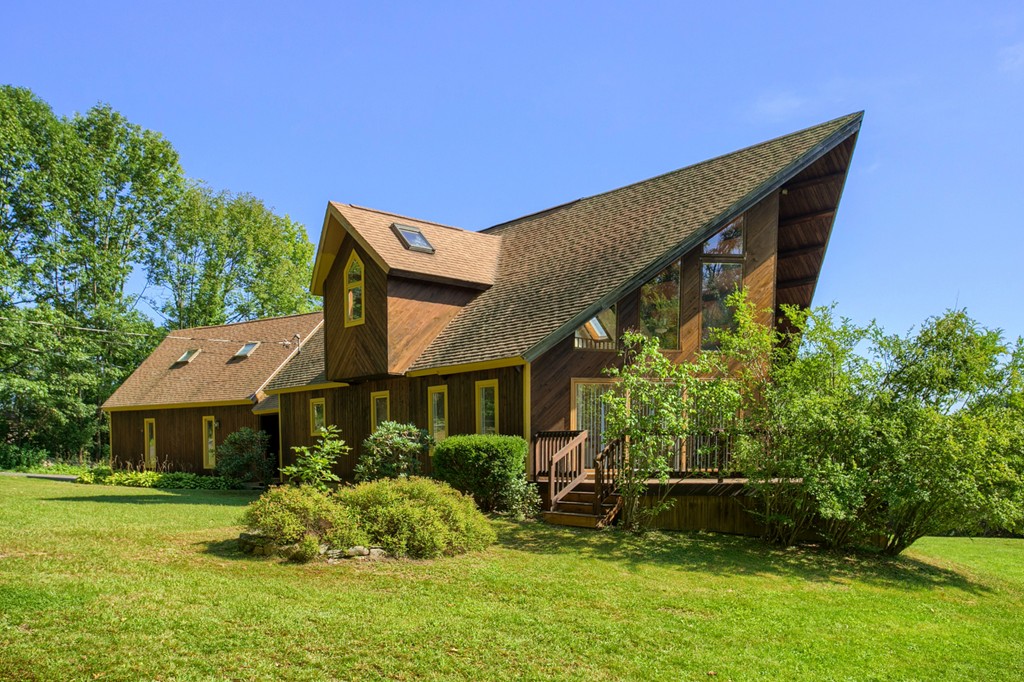 773 Moore Hill Road Athol, MA 01331 - Photo 1 of 30 a front view of a house with a garden