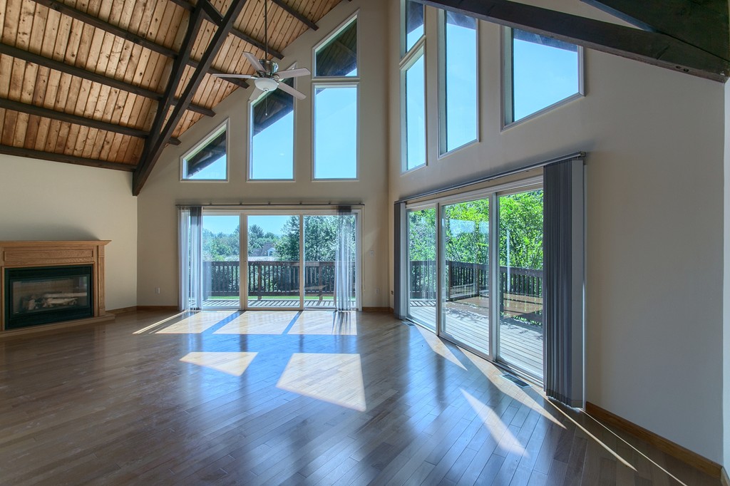 773 Moore Hill Road Athol, MA 01331 - Photo 7 of 30 a view of an empty room with wooden floor and a window
