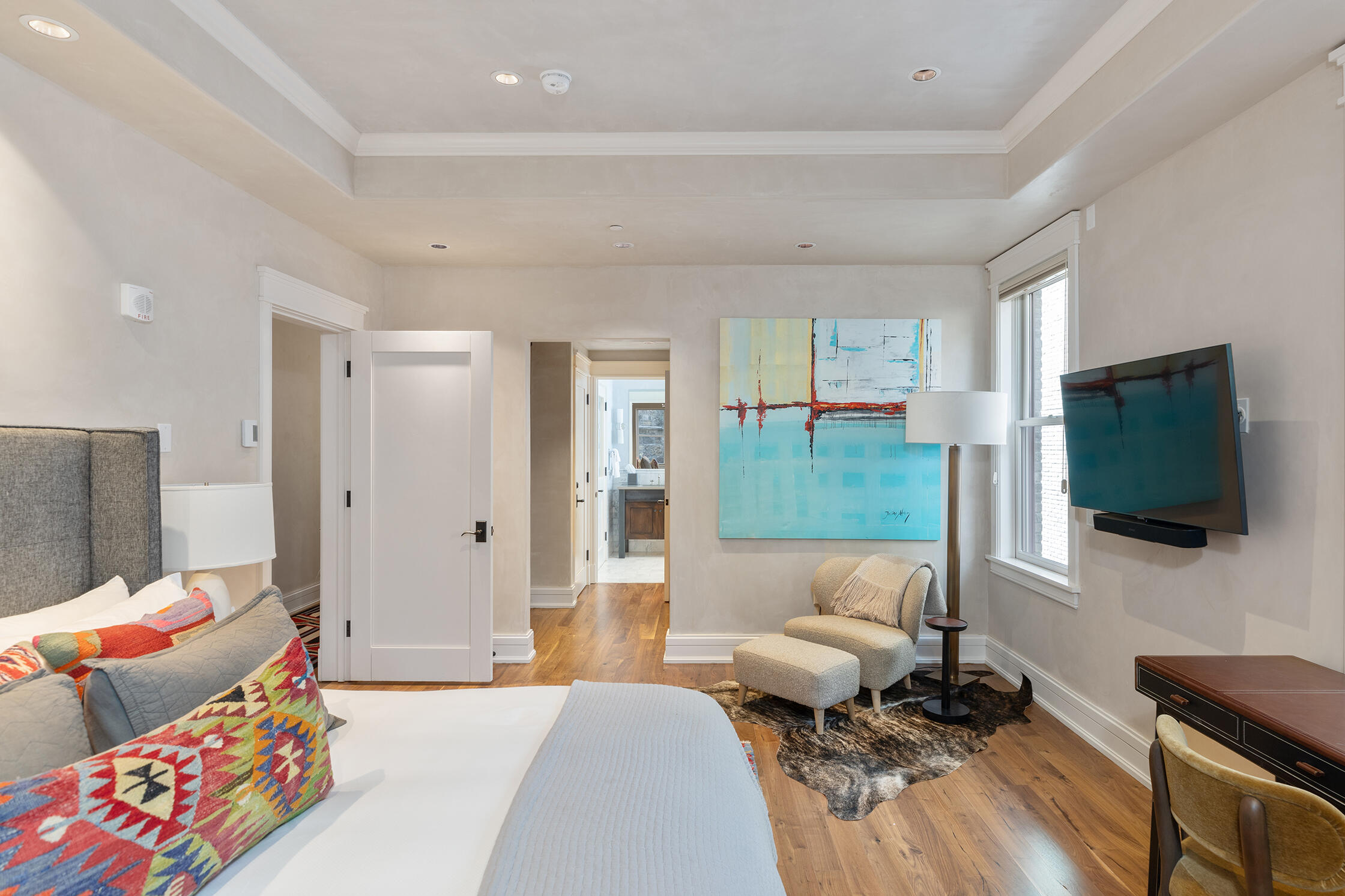 398 South Davis Street, Unit SW 201 Telluride, CO 81435 - Photo 17 of 23 a living room with furniture and a flat screen tv