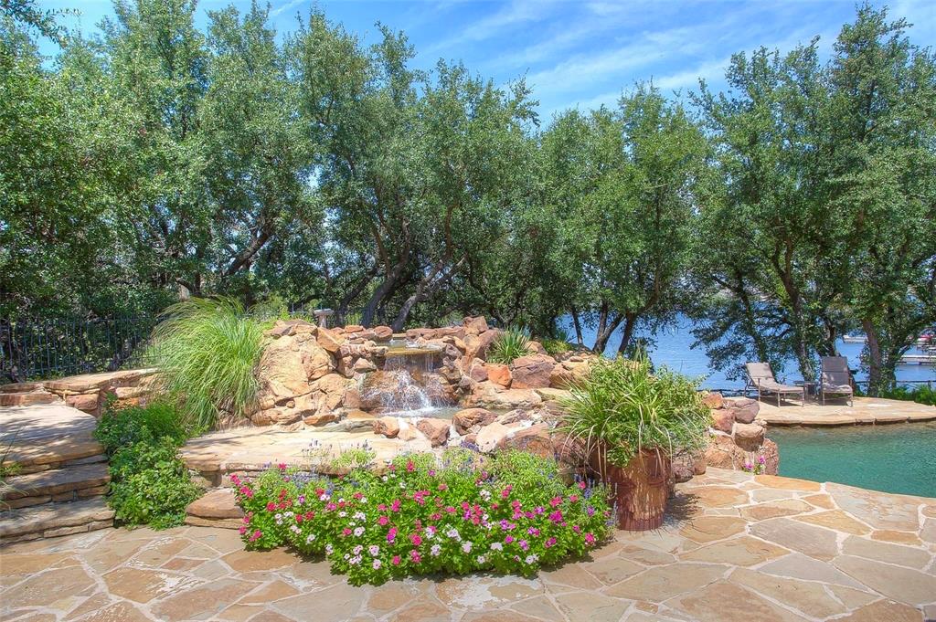 1015 Keechi Trail Graford, TX 76449 - Photo 9 of 13 a view of a garden with an outdoor space