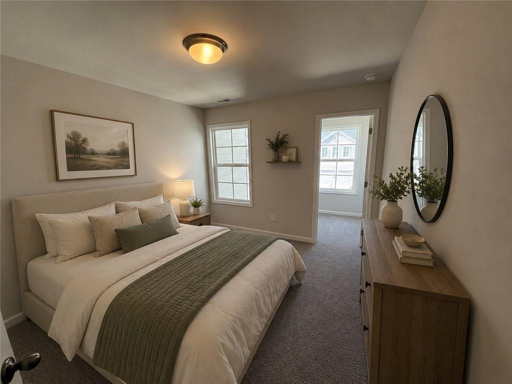 5151 Longview Run Decatur, GA 30035 - Photo 22 of 24 a bedroom with bed mirror and window
