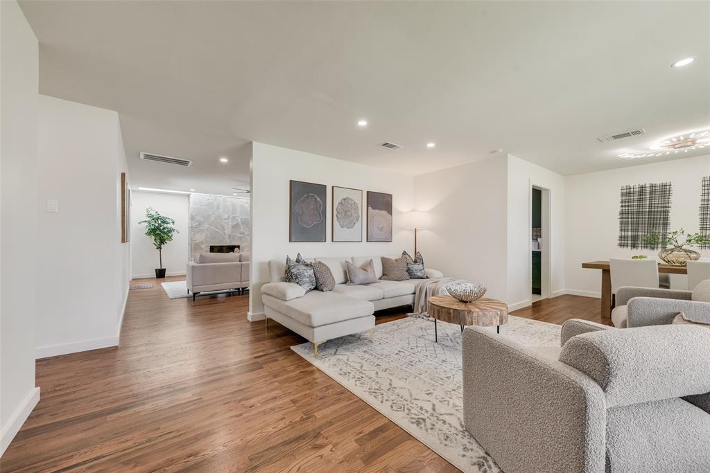 3106 Sharpview Lane Dallas, TX 75228 - Photo 16 of 33 a living room with furniture and a wooden floor