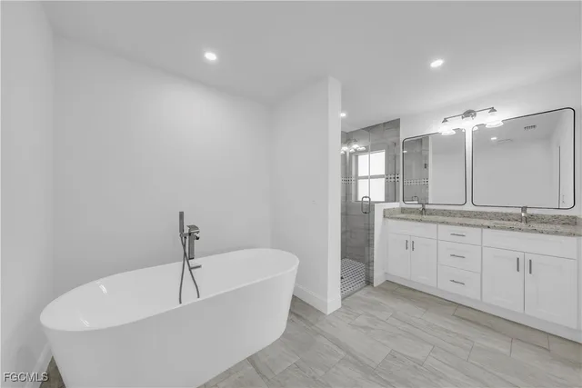 a kitchen with a sink and a stove