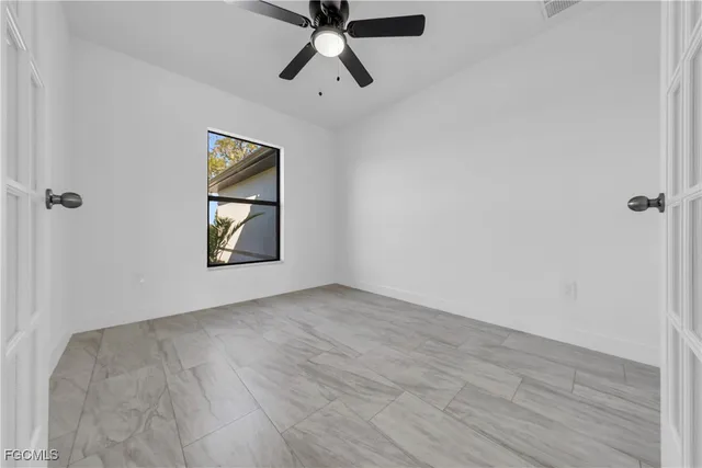 a view of a balcony with lake view and a floor to ceiling window
