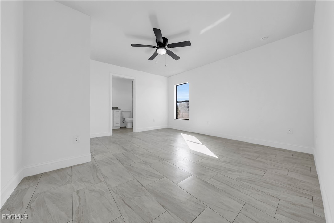 7979 16th Place LaBelle, FL 33935 - Photo 19 of 36 wooden floor in an empty room