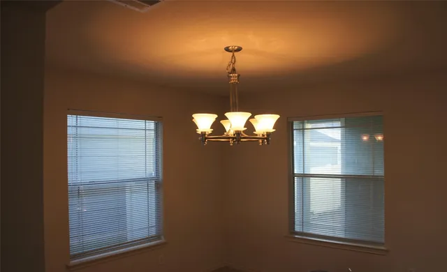 a view of a decorative light in a hallway