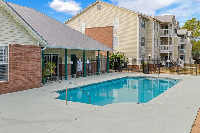 a view of a house with a swimming pool