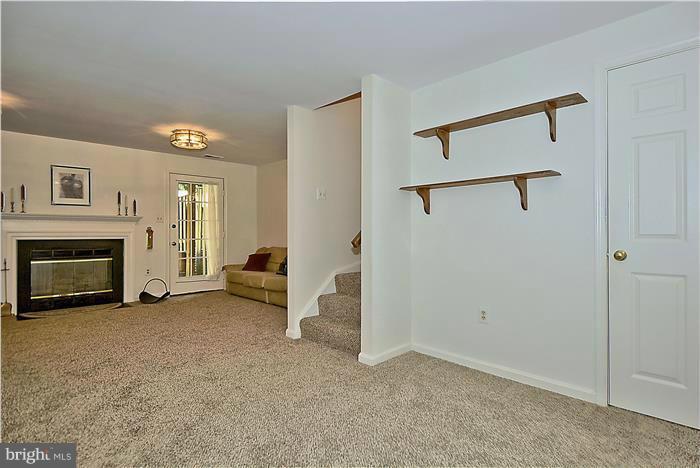 4232 Devonwood Way Woodbridge, VA 22192 - Photo 20 of 30 a view of a livingroom with a fireplace