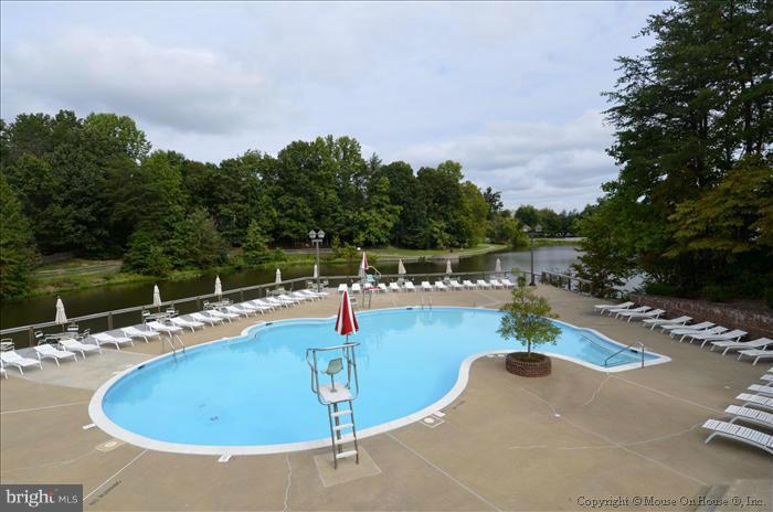 4232 Devonwood Way Woodbridge, VA 22192 - Photo 30 of 30 a view of a swimming pool with a yard
