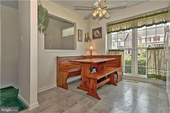 4232 Devonwood Way Woodbridge, VA 22192 - Photo 5 of 30 a room with furniture and a chandelier