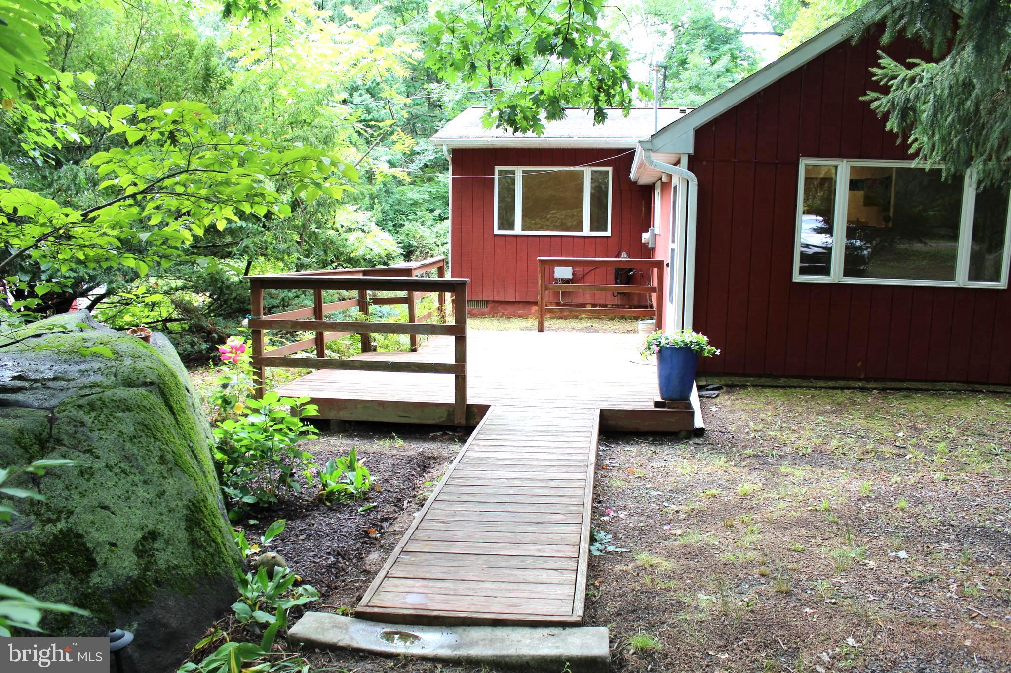 a view of a deck with a yard