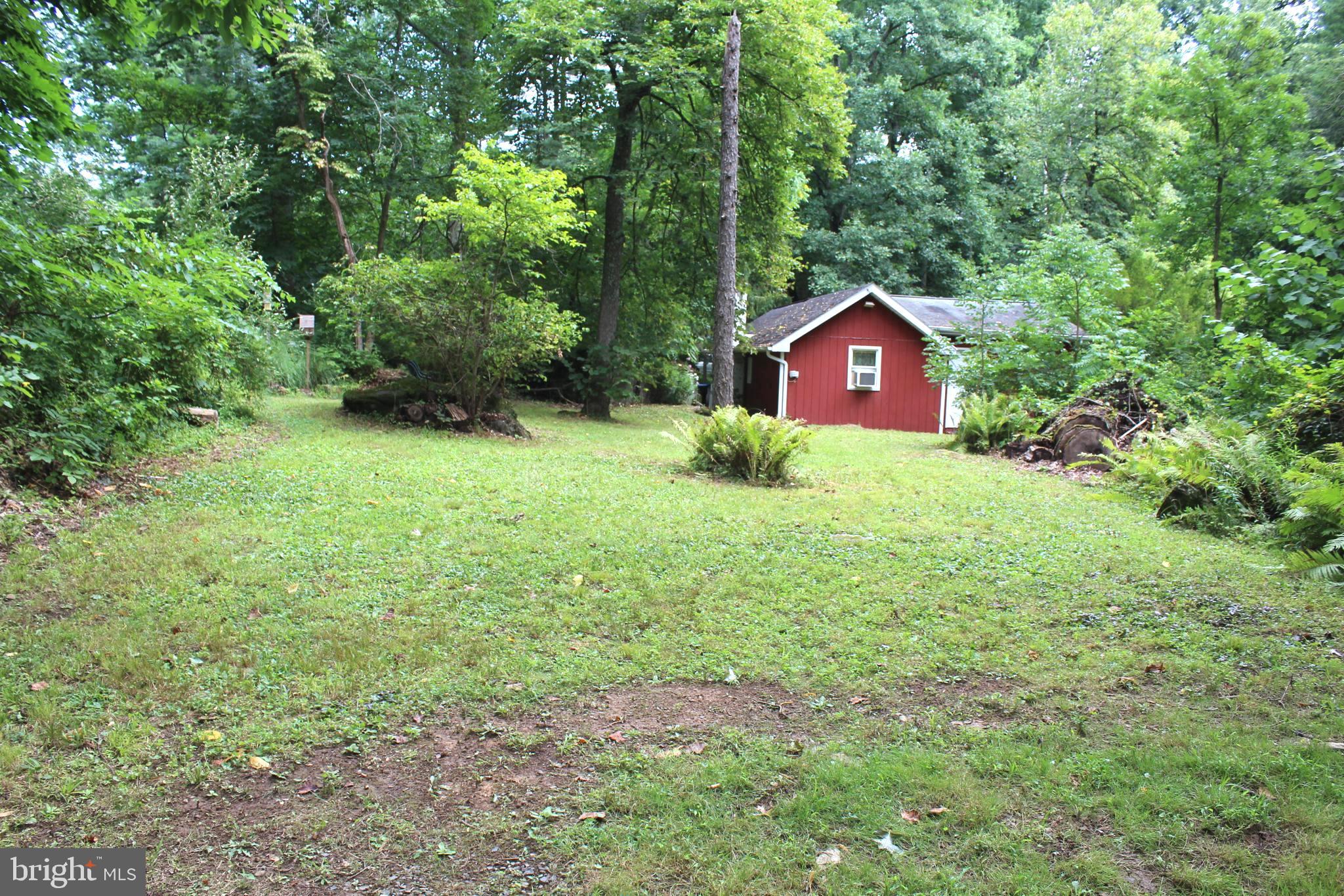 1068 Magazine Road Green Lane, PA 18054 - Photo 24 of 70 VIEW OF HOME FROM WOODS
