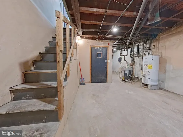 a view of an empty room with stairs