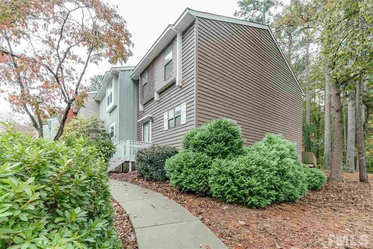 5757 3 Oaks Drive Raleigh, NC 27612 - Photo 2 of 20 a view of a house with a yard