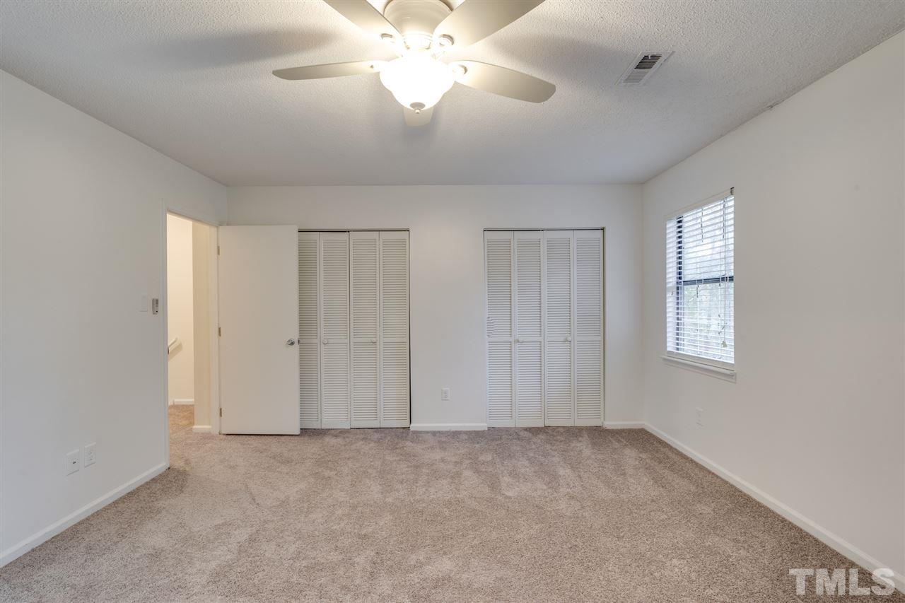5757 3 Oaks Drive Raleigh, NC 27612 - Photo 12 of 20 a view of an empty room with a window