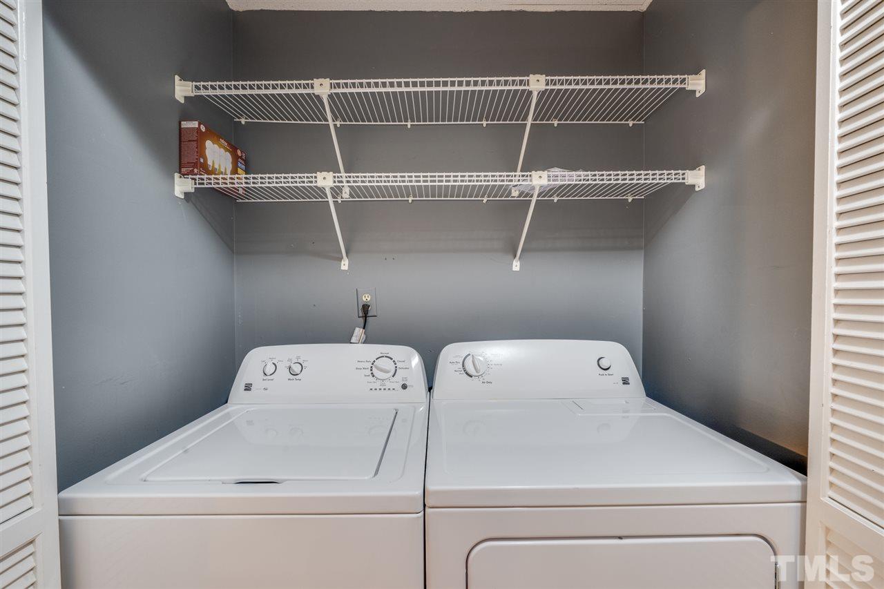 5757 3 Oaks Drive Raleigh, NC 27612 - Photo 18 of 20 a utility room with dryer and washer