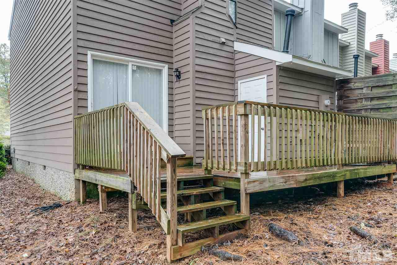 5757 3 Oaks Drive Raleigh, NC 27612 - Photo 19 of 20 a view of a house with a yard
