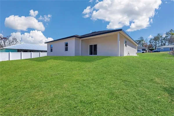 a house view with a garden space