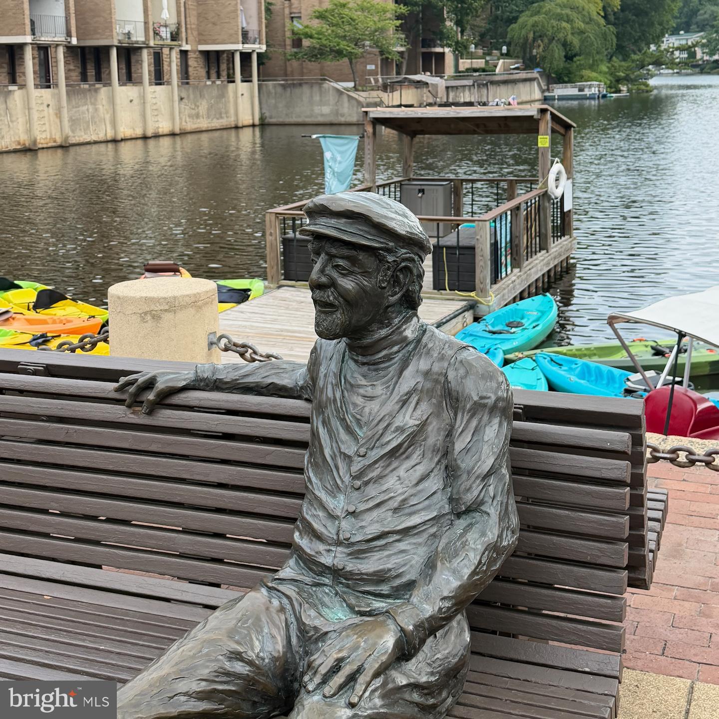 1676 Chimney House Road Reston, VA 20190 - Photo 49 of 56 Robert E. Simon sits at the lake.