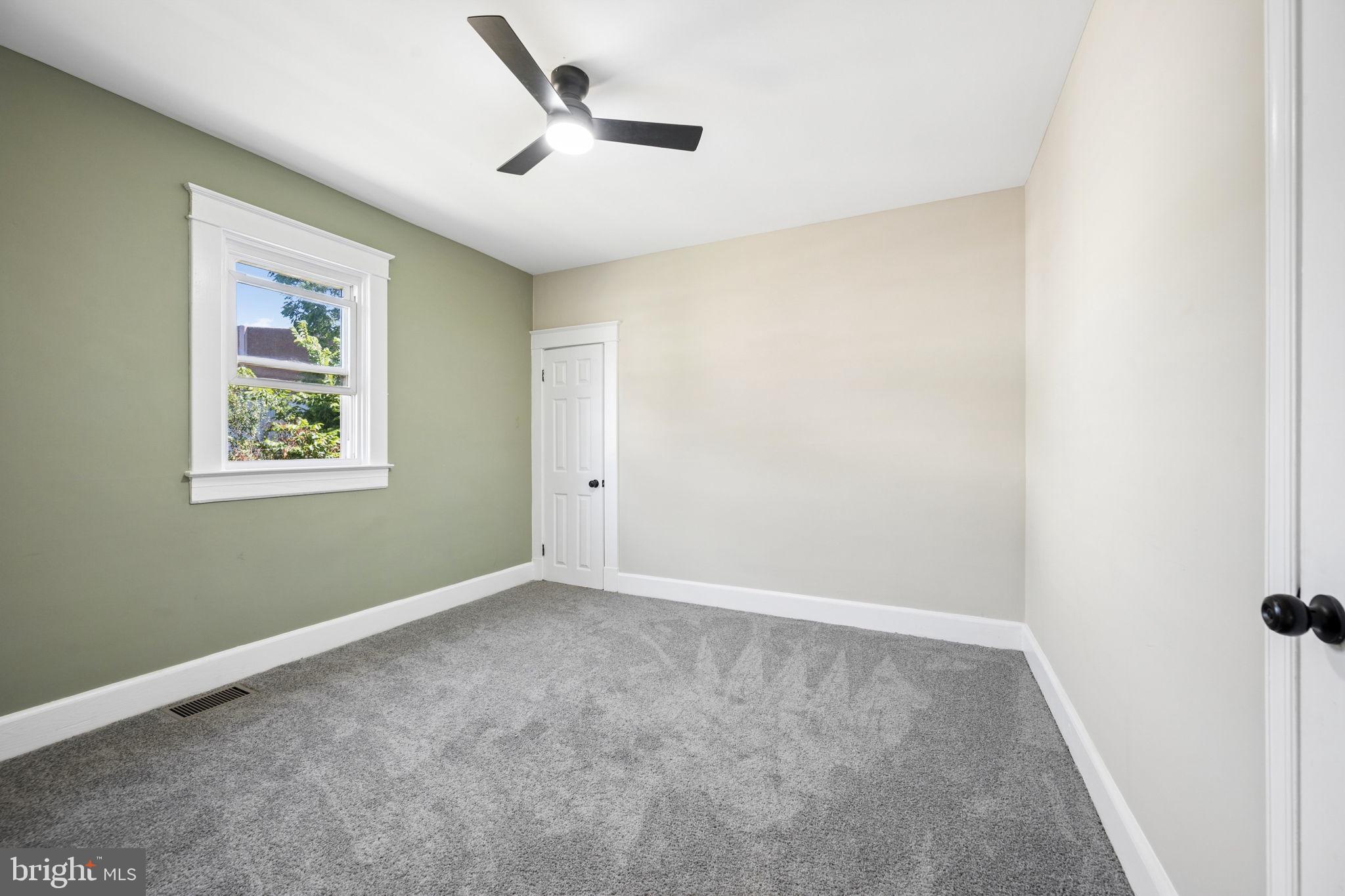 517 Valcour Road Baltimore, MD 21228 - Photo 26 of 47 a view of room with window and ceiling fan
