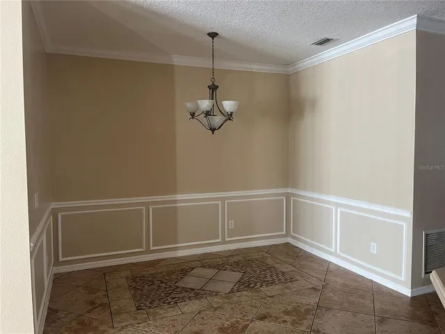 a view of a small space with racks on the wall