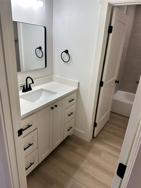 150 Ridge Road Tuscola, TX 79562 - Photo 9 of 12 a bathroom with a sink and a mirror