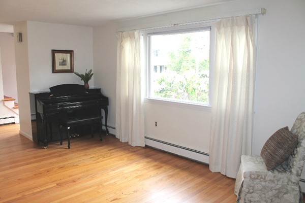 16 Freemont Street Lexington, MA 02421 - Photo 3 of 25 a bedroom with a bed and a window