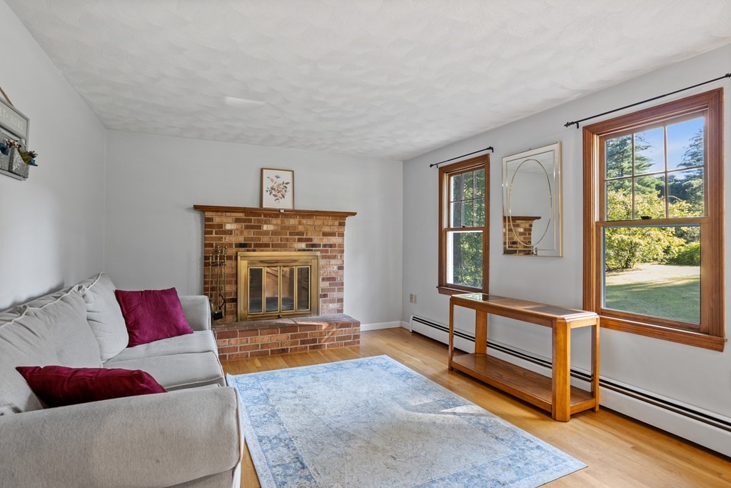 10 Pheasant Ridge Road Townsend, MA 01469 - Photo 14 of 40 a living room with furniture and a window